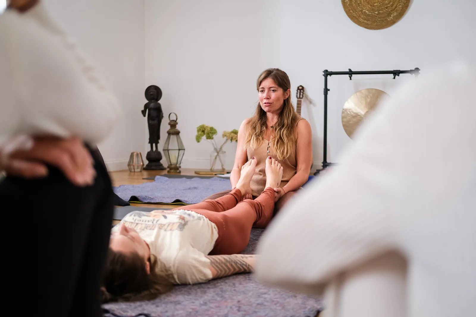 Kathrin teaching bodywork to a small group